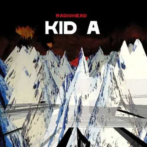 Kid A アルバム・カバーの山体と冷色の風景